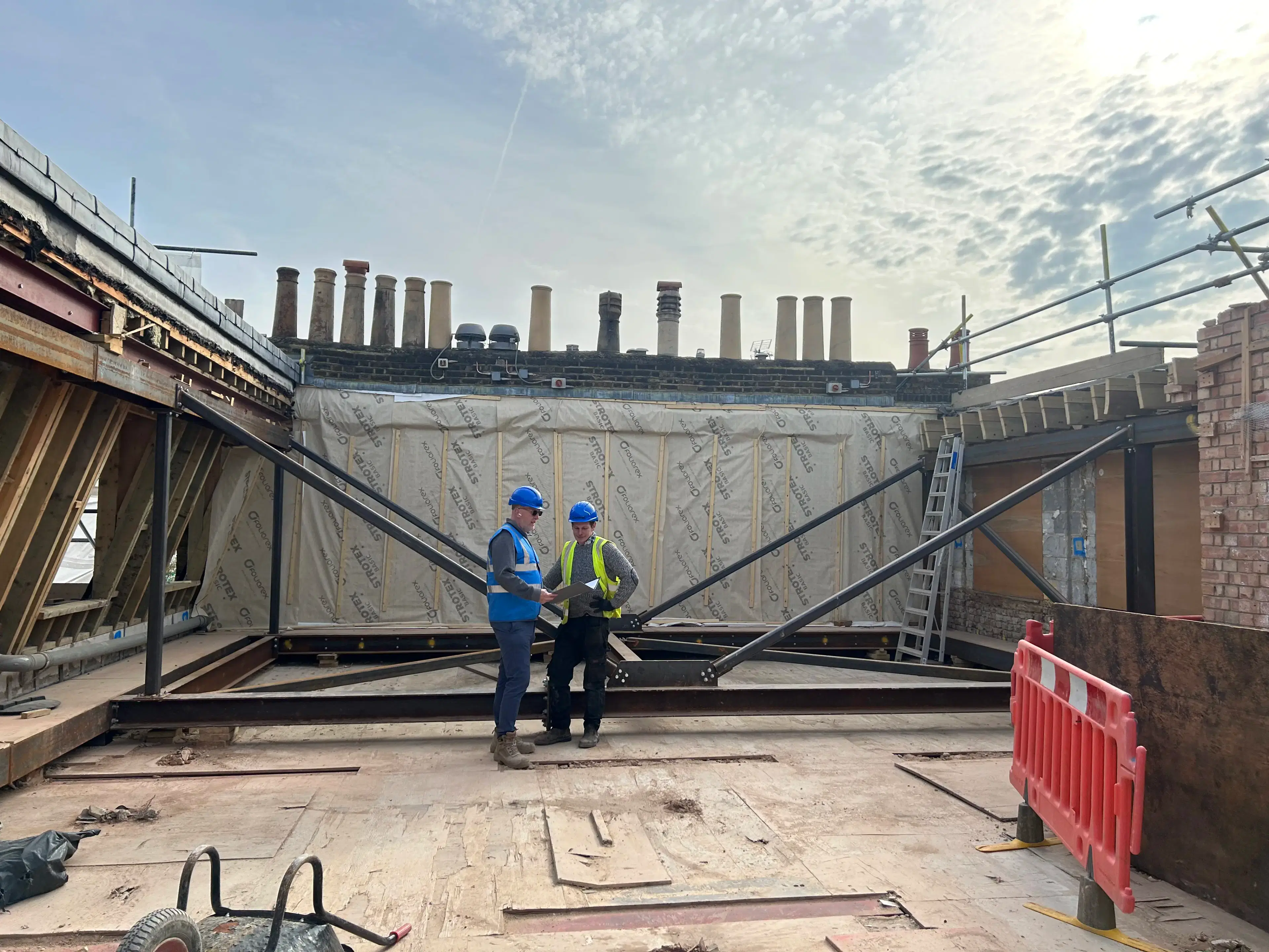 Steel construction workers on site